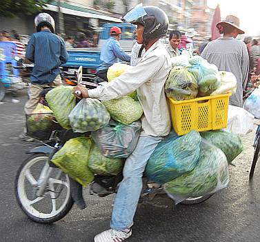 Motorcycle loaded with vegetables